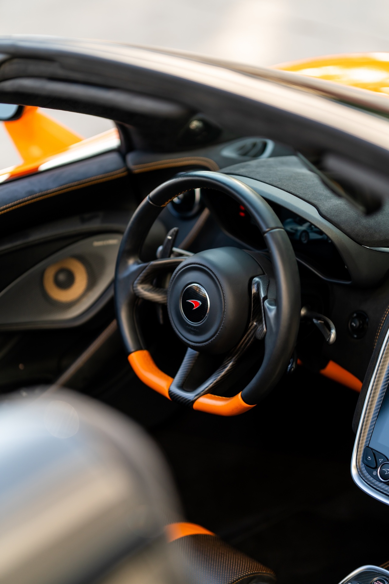 McLaren steering wheel with carbon and orange detail